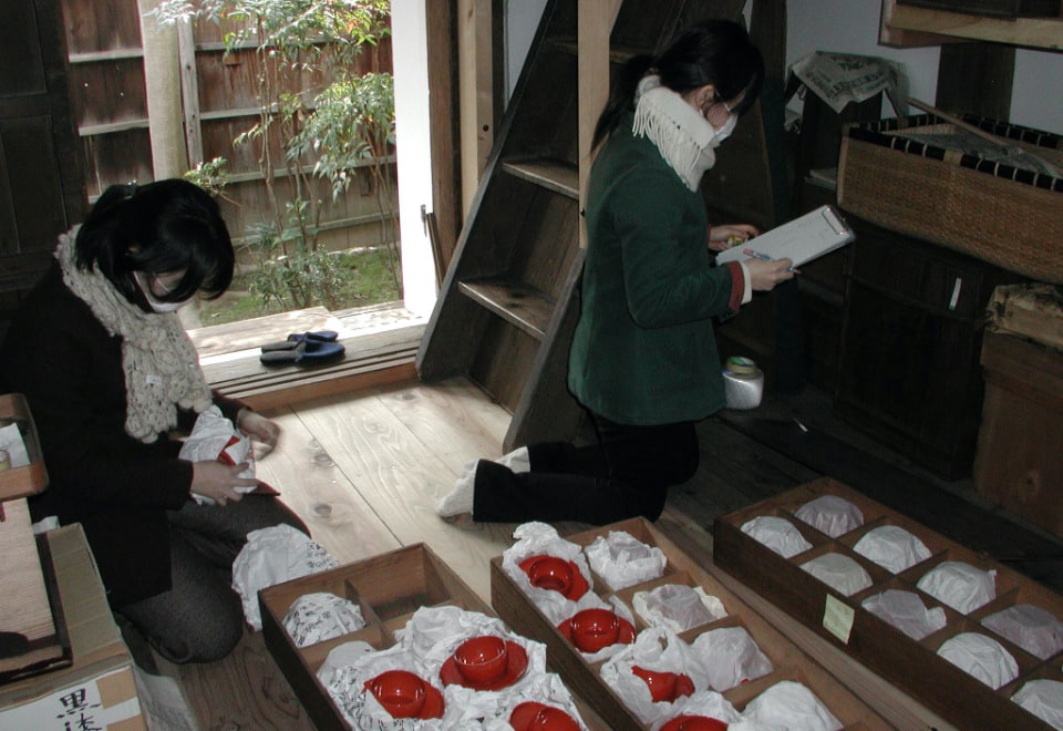 Students assisting with a temple inventory 