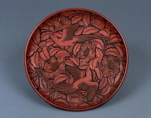 Carved Cinnabar Lacquer Tray with Blue Magpies and Camellias China, Yuan Dynasty (14th century) Diameter 32.4cm, height 3.5 cm Important Cultural Property (Korin-in Temple, Kyoto)